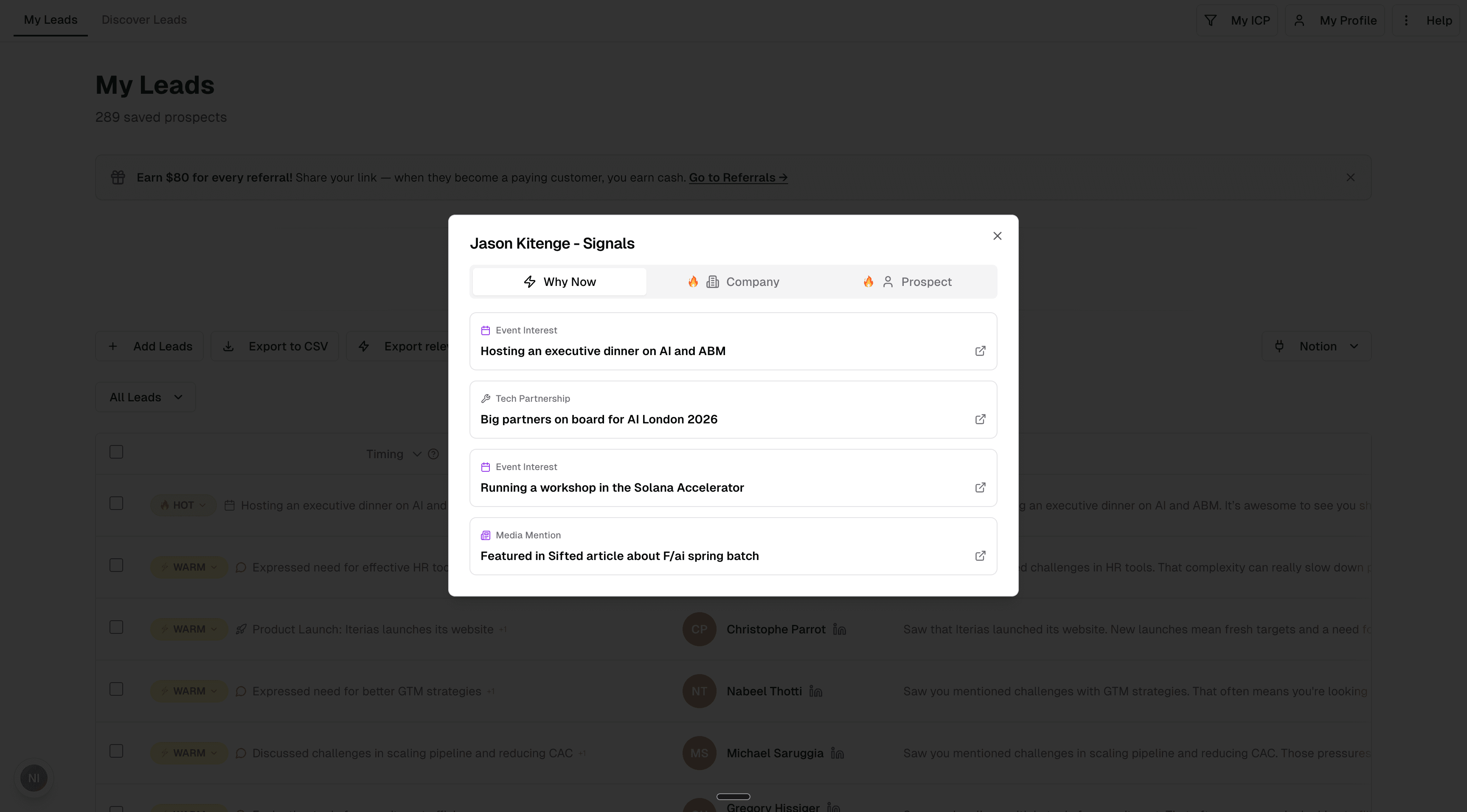 Signal detail view showing Why Now buying signals for a prospect — event interest, tech partnerships, and media mentions